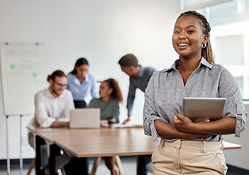 Woman standing in front of a meeting